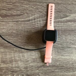 Fitbit Versa and charger